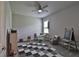 Playroom with a checkerboard mat, toys, and a small table at 2423 Wild Turkey Creek Ln, Port Orange, FL 32128