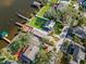 Aerial view of waterfront home and neighboring houses at 243 Lexington Dr, Daytona Beach, FL 32114