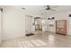 Living room with hardwood floors and kitchen view at 243 Lexington Dr, Daytona Beach, FL 32114