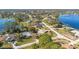 Aerial view of homes near a lake, highlighting the waterfront location of the houses at 2501 Alton Rd, Deltona, FL 32738