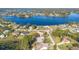 Aerial view of lakefront homes and neighborhood, providing a view of the area at 2501 Alton Rd, Deltona, FL 32738