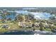 Aerial view of waterfront community, showcasing the neighborhood and lake views at 2501 Alton Rd, Deltona, FL 32738