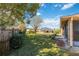 Spacious backyard with a wooden fence and grassy area at 2501 Alton Rd, Deltona, FL 32738