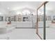 Spacious bathroom with double vanity and large tub at 2501 Alton Rd, Deltona, FL 32738