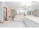 Bathroom with double vanity, soaking tub and toilet at 2501 Alton Rd, Deltona, FL 32738