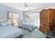 Bedroom with twin beds, dresser and wardrobe at 2501 Alton Rd, Deltona, FL 32738