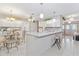 Bright kitchen boasts granite counters and white cabinets at 2501 Alton Rd, Deltona, FL 32738