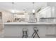 Spacious kitchen with granite countertops and island at 2501 Alton Rd, Deltona, FL 32738