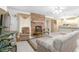 Living room features a brick fireplace and kitchen view at 2501 Alton Rd, Deltona, FL 32738