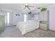 Main bedroom with mirrored furniture and ceiling fan at 2501 Alton Rd, Deltona, FL 32738