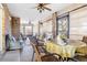 Spacious sunroom with ample seating and a dining area at 2501 Alton Rd, Deltona, FL 32738