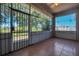 Enjoy the outdoors in this screened patio with tiled floor and metal security bars at 2545 Windsor Heights St, Deltona, FL 32738