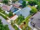 Aerial view shows house, pool, and surrounding neighborhood at 2911 Wild Pepper Ave, Deltona, FL 32725