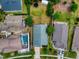 Aerial view shows house, pool, and surrounding neighborhood at 2911 Wild Pepper Ave, Deltona, FL 32725