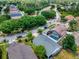 Aerial view of house, community, and pool at 2911 Wild Pepper Ave, Deltona, FL 32725