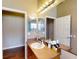 Bathroom with a vanity and access to another room at 2911 Wild Pepper Ave, Deltona, FL 32725