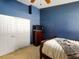Spacious bedroom with double doors and a ceiling fan at 2911 Wild Pepper Ave, Deltona, FL 32725