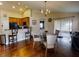 Kitchen and dining area with hardwood floors at 2911 Wild Pepper Ave, Deltona, FL 32725