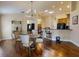 Bright dining area with hardwood floors and chandelier at 2911 Wild Pepper Ave, Deltona, FL 32725
