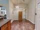Open dining area with hardwood floors and access to the kitchen at 2911 Wild Pepper Ave, Deltona, FL 32725