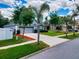 House exterior features a two-car garage and manicured lawn at 2911 Wild Pepper Ave, Deltona, FL 32725