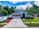 Lovely house with a two-car garage and well-manicured lawn at 2911 Wild Pepper Ave, Deltona, FL 32725