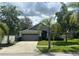 Charming single-Gathering home featuring a well-manicured lawn and a two-car garage at 2911 Wild Pepper Ave, Deltona, FL 32725