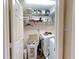 Convenient laundry room with washer, dryer, and storage shelves at 2911 Wild Pepper Ave, Deltona, FL 32725
