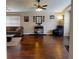 Bright living room with hardwood floors and a cozy sitting area at 2911 Wild Pepper Ave, Deltona, FL 32725