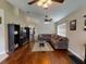 Spacious living area featuring hardwood floors and ample natural light at 2911 Wild Pepper Ave, Deltona, FL 32725