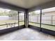 Spacious screened porch overlooks backyard at 2911 Wild Pepper Ave, Deltona, FL 32725