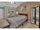 Cozy bedroom featuring a double bed and access to a full bathroom at 2994 Annez Way, Debary, FL 32713