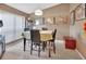 Dining room with four chairs and a large window at 2994 Annez Way, Debary, FL 32713