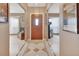 Bright entryway with tile floor and wood door at 2994 Annez Way, Debary, FL 32713