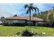Charming brick home with well-maintained lawn and lovely landscaping at 2994 Annez Way, Debary, FL 32713