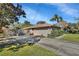 House exterior showing a two-car garage and driveway at 2994 Annez Way, Debary, FL 32713