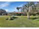 Front view of a single-story home with manicured landscaping at 2994 Annez Way, Debary, FL 32713