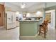 Bright kitchen with ample cabinetry and island at 2994 Annez Way, Debary, FL 32713