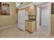 Well-equipped kitchen with refrigerator and additional cabinetry at 2994 Annez Way, Debary, FL 32713