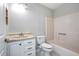 Clean bathroom with a white vanity, toilet and bathtub at 3164 Chamberlain St, Deltona, FL 32738