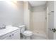 Clean bathroom with white vanity and shower stall at 3164 Chamberlain St, Deltona, FL 32738