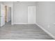 Bedroom with grey flooring and access to bathroom at 3164 Chamberlain St, Deltona, FL 32738