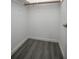 Spacious walk-in closet with grey flooring and hanging rod at 3164 Chamberlain St, Deltona, FL 32738