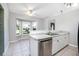 Eat-in kitchen with stainless steel dishwasher and bay window at 3164 Chamberlain St, Deltona, FL 32738