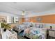 Bright bedroom with two double beds, coastal decor, and plenty of light at 3509 S Atlantic Ave # 301, New Smyrna Beach, FL 32169