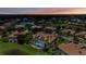 Aerial view of houses with pools in a Florida community at 3548 Tuscany Reserve Blvd, New Smyrna Beach, FL 32168