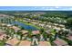 Community overview showcasing luxury homes and lake at 3548 Tuscany Reserve Blvd, New Smyrna Beach, FL 32168