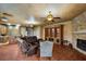 Finished basement with built-in shelving and fireplace at 3548 Tuscany Reserve Blvd, New Smyrna Beach, FL 32168