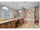 Elegant bathroom with double vanities, soaking tub, and large mirror at 3548 Tuscany Reserve Blvd, New Smyrna Beach, FL 32168