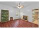 Spacious bedroom with hardwood floors and ample natural light at 3548 Tuscany Reserve Blvd, New Smyrna Beach, FL 32168